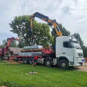 Crane truck transport service in Tartu and Estonia. Construction material transport with lifting - loading, transportation and lifting to the site with one truck. Crane trucks with trailers.
