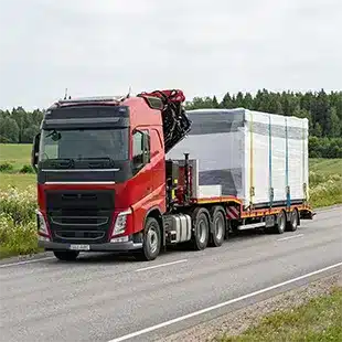 Ülegabariidiline vedu platvorm poolhaagisega. Moodulmajade, tööstusseadmete ja erikoorma transport. Eriloa taotlemine ja marsruudi planeerimine.